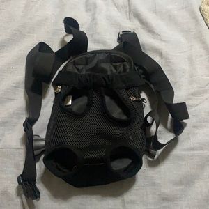 Cute black puppy carrier